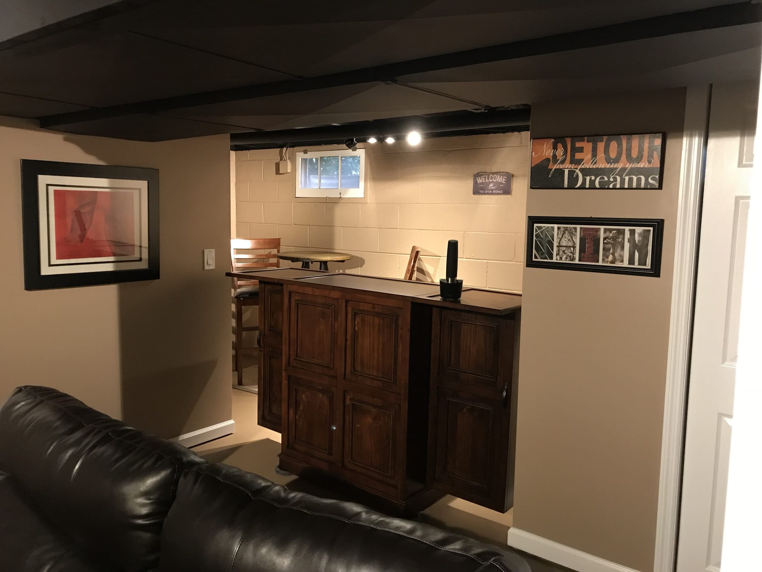 Finished basement with custom built-ins by Modern Master, serving Warren, NJ